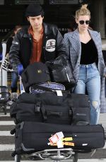 LILI REINHART and Cole Sprouse  at LAX Airport in Los Angeles 04/04/2018
