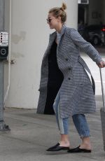 LILI REINHART and Cole Sprouse  at LAX Airport in Los Angeles 04/04/2018