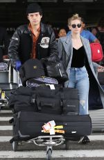 LILI REINHART and Cole Sprouse  at LAX Airport in Los Angeles 04/04/2018