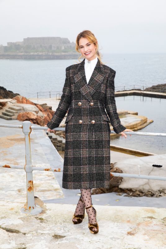 LILY JAMES at The Guernsey Literary and Potato Peel Pie Society Photocall in Guernsey 04/12/2018