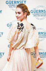 LILY JAMES at The Guernsey Literary and Potato Peel Pie Society Premiere in Guernsey 04/12/2018