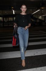 LUCY HALE in Jeans at LAX Airport in Los Angeles 04/19/2018