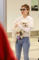 LUCY HALE with Her Dog at LAX Airport in Los Angeles 04/02/2018
