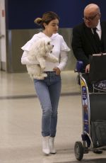 LUCY HALE with Her Dog at LAX Airport in Los Angeles 04/02/2018