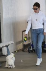 LUCY HALE with Her Dog at LAX Airport in Los Angeles 04/02/2018