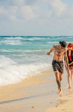 MADELAINE PETSCH and Travis Mills at a Beach in Cancun 04/18/2018