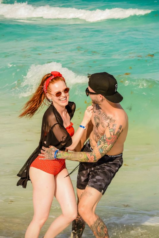 MADELAINE PETSCH and Travis Mills at a Beach in Cancun 04/18/2018