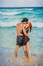 MADELAINE PETSCH and Travis Mills at a Beach in Cancun 04/18/2018