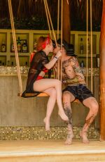 MADELAINE PETSCH and Travis Mills at a Beach in Cancun 04/18/2018