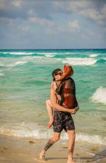 MADELAINE PETSCH and Travis Mills at a Beach in Cancun 04/18/2018