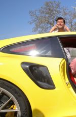 MARIA SHARAPOVA and Mark Webber Driving Porsche 911 RT2 RS in Stuttgart 04/20/2018