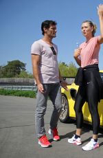 MARIA SHARAPOVA and Mark Webber Driving Porsche 911 RT2 RS in Stuttgart 04/20/2018