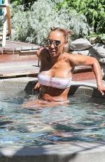 MELANIE BROWN in Bikini at a Pool in Palm Springs 04/10/2018