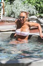 MELANIE BROWN in Bikini at a Pool in Palm Springs 04/10/2018
