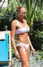 MELANIE BROWN in Bikini at a Pool in Palm Springs 04/10/2018