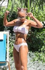 MELANIE BROWN in Bikini at a Pool in Palm Springs 04/10/2018