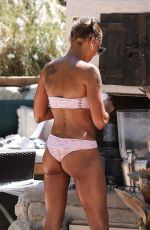 MELANIE BROWN in Bikini at a Pool in Palm Springs 04/10/2018