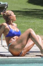 MELANIE BROWN in Bikini at a Pool in Palm Springs 04/15/2018