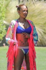 MELANIE BROWN in Bikini at a Pool in Palm Springs 04/15/2018