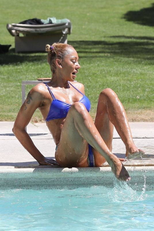 MELANIE BROWN in Bikini at a Pool in Palm Springs 04/15/2018