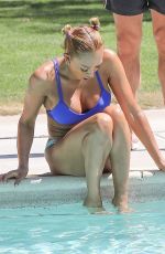 MELANIE BROWN in Bikini at a Pool in Palm Springs 04/15/2018