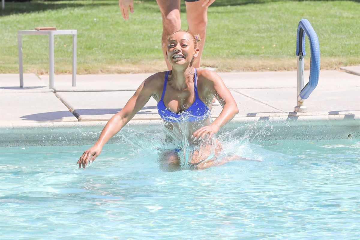 MELANIE BROWN in Bikini at a Pool in Palm Springs 04/15/2018.