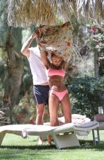 MELANIE BROWN in Bikini on Vacation at a Resort in Desert Hot Springs 04/19/2018