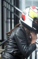 MELANIE SYKES Getting off Her Taxi Bike 04/26/2018