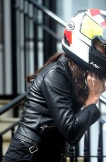 MELANIE SYKES Getting off Her Taxi Bike 04/26/2018
