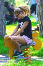 MICHELLE HUNZIKER at a Park in Bergamo 04/28/2018
