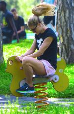 MICHELLE HUNZIKER at a Park in Bergamo 04/28/2018