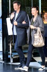 MILLA JOVOVICH and Paul W. S. Anderson Shopping at Prada Store in Beverly Hills 04/02/2018