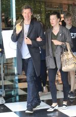 MILLA JOVOVICH and Paul W. S. Anderson Shopping at Prada Store in Beverly Hills 04/02/2018