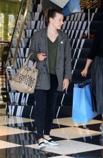 MILLA JOVOVICH and Paul W. S. Anderson Shopping at Prada Store in Beverly Hills 04/02/2018