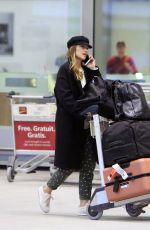 MINKA KELLY Arrives at Airport in Toronto 04/24/2018