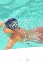 NATHALIE KELLY in Swimsuit at a Pool in Bondi 04/17/2018