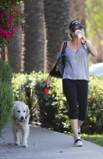 NICOLLETTE SHERIDAN Walks Her Dog Out in Calabasas 04/14/2018