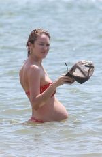 Pregnant CANDICE SWANEPOEL in Bikini on the Beach in Mexico 04/01/2018