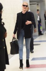 ROSIE HUNTINGTON-WHITELEY at JFK Airport in New York 04/03/2018