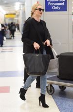 ROSIE HUNTINGTON-WHITELEY at JFK Airport in New York 04/03/2018