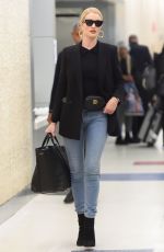 ROSIE HUNTINGTON-WHITELEY at JFK Airport in New York 04/03/2018