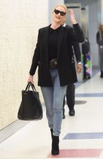 ROSIE HUNTINGTON-WHITELEY at JFK Airport in New York 04/03/2018