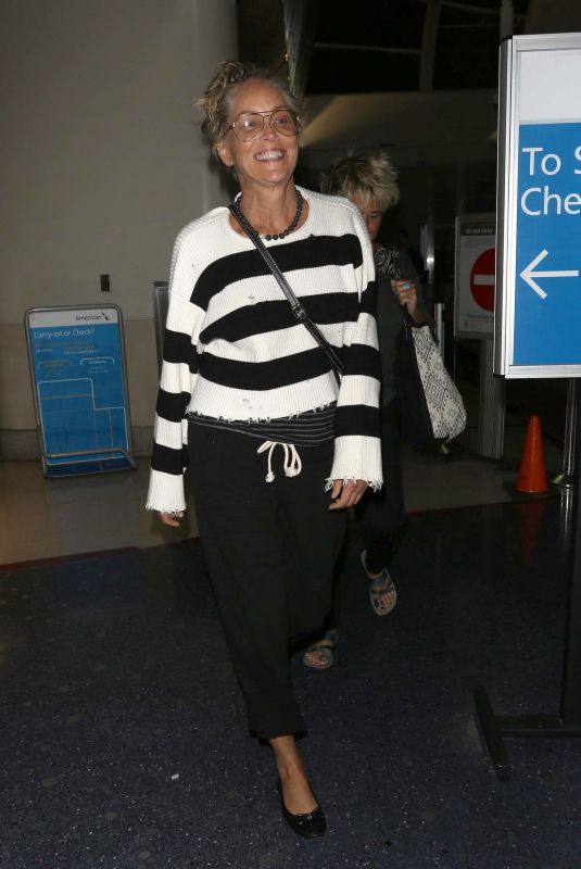 SHARON STONE at LAX Airport in Los Angeles 04/13/2018