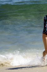 SHERYL CROW in Swimsuit at a Beach in Perth 04/03/2018
