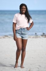 SLOANE STEPHENS Poses with Miami Open Championship Trophy at Crandon Beach 03/31/2018