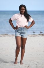 SLOANE STEPHENS Poses with Miami Open Championship Trophy at Crandon Beach 03/31/2018