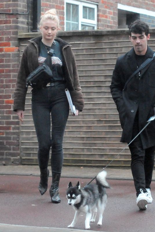 SOPHIE TURNER and Joe Jonas Walks Their Dog Out in London 04/03/2018