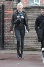 SOPHIE TURNER and Joe Jonas Walks Their Dog Out in London 04/03/2018