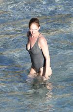 UMA THURMAN in Swimsuit at a Beach in St Barts 04/02/2018