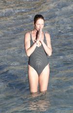 UMA THURMAN in Swimsuit at a Beach in St Barts 04/02/2018